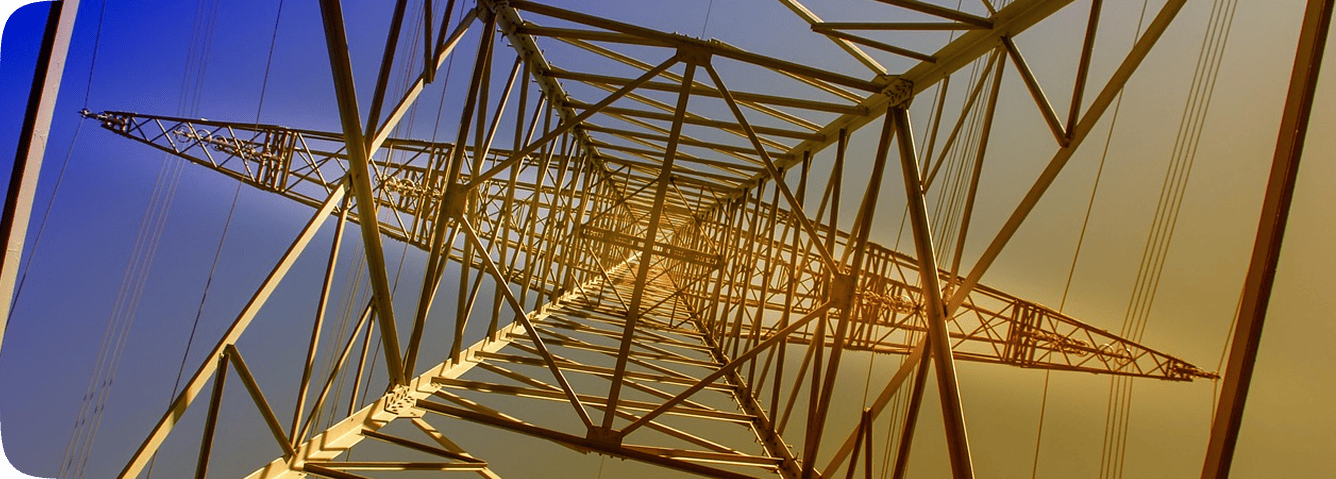 Industrial power transmission tower viewed from below
